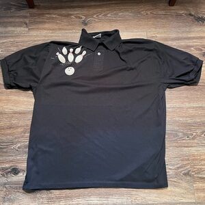Black graphic design polo t-shirt